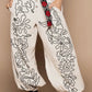 Off White & Black Embroidered Pants