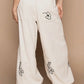 Off White & Black Embroidered Pants
