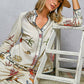 Off White Print Shirt with Cowrie Shell Detail