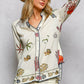 Off White Print Shirt with Cowrie Shell Detail