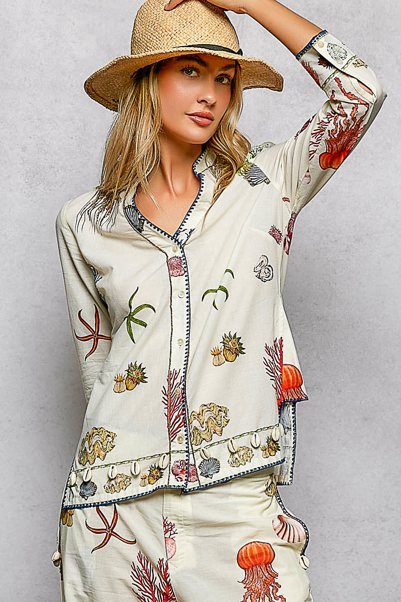 Off White Print Shirt with Cowrie Shell Detail