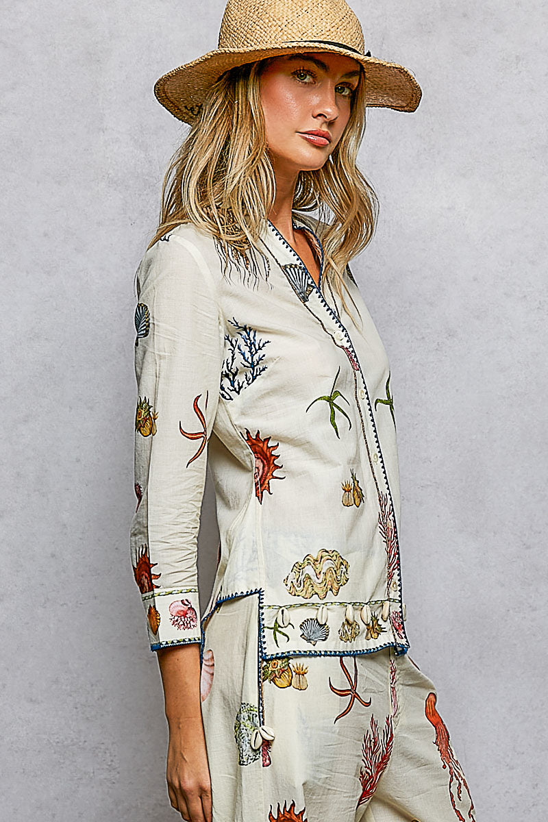 Off White Print Shirt with Cowrie Shell Detail