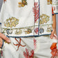 Off White Print Shirt with Cowrie Shell Detail