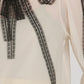 Cream Blouse with Black Lace Embellishment