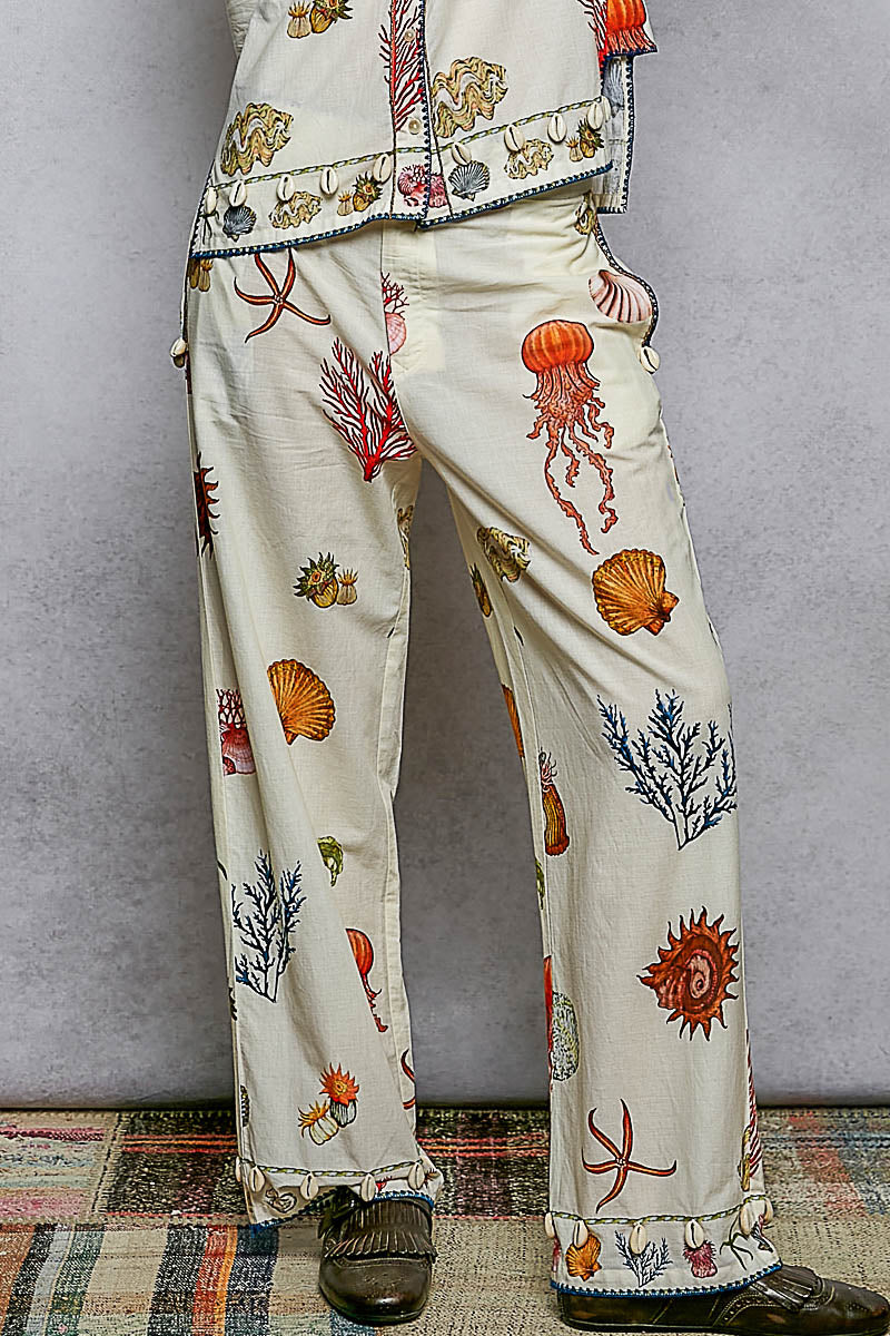 Off White Print Pants with Cowrie Shell Detail