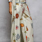 Off White Print Pants with Cowrie Shell Detail